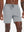 Front lower-body view from waist to knees of model wearing LIGHT GREY 2 in 1 Running Sports Shorts with Liner