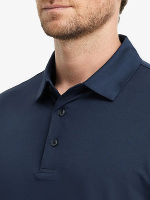 Close-up front (nose to chest) of Everyday Solid Jersey Polo in NAVY, showing rich fabric texture.