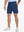 Front lower-body view of model wearing BLUE INDIGO Water Resistant Versatile 8 Pockets Shorts.