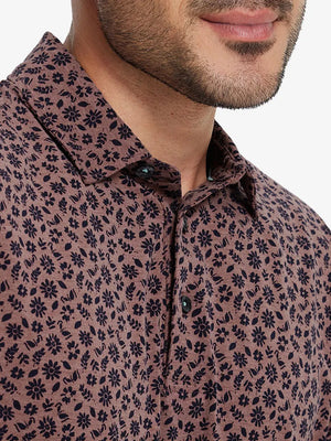 Front half-body view from nose to chest of model wearing WINE RED FLOWER Popular Heather Print Polo