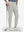 Front lower body shot of model wearing silver gray flat front golf joggers pants with belt loops
