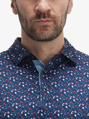 Front view from nose to chest of model wearing the american elements 4 way stretch print collared polo shirt, showcasing the upper fit