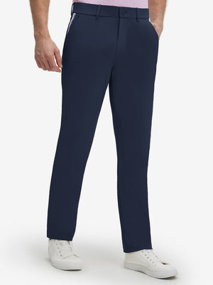 Front lower body shot of model wearing navy breathable casual slacks with 4 pockets