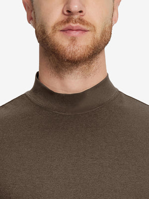 Close-up collar view from nose to chest, showing fine fabric texture of the Brown turtleneck.
