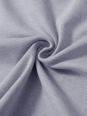 Fabric close-up showing the material of navy two tone pique cotton blend q-zip.