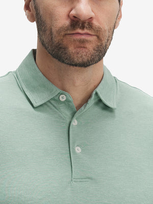 Front view from nose to chest of model wearing grey green ultra-light quick dry moisture wicking collared polo shirt