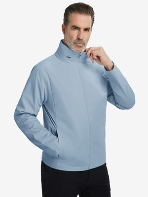 Model wearing the lightweight water-repellent softshell hooded jacket, slate blue, front upper-body outdoor style.