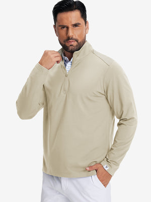 Model front upper body wearing Fleece lined golf quarter zip with sleek taupe look