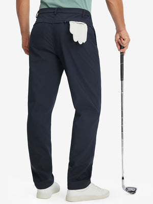 Model holding a golf club with one hand, back lower body shot wearing navy thermal water repellent fleece dress pants