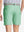 Back view of youth in mint green Heather Performance Golf Shorts, highlighting rear design and fit