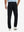 Back view of model wearing water-resistant golf stretch nylon pants, tailored stretch fit in black.