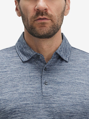 Front view from nose to chest of model wearing misty blue white grid ultra-light quick dry moisture wicking collared polo shirt