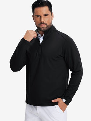 Model front upper body wearing Fleece lined golf quarter zip with sleek black look
