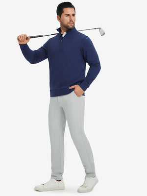Model carrying a golf club on shoulder, wearing silver grey lightweight moisture wicking dress pants.