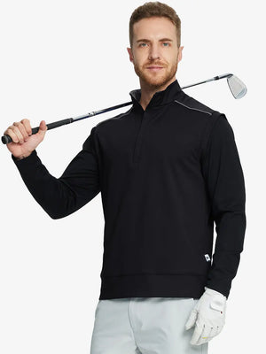 Half-body front view of model holding golf club wearing BLACK Stretch Solid Fleece Quarter-Zip Vest.								
