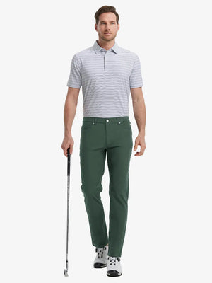 Full-body front shot with golf club, styled in Stretch Plain Everyday Pants – OLIVE GREEN