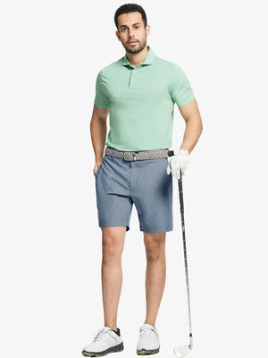Full body front view of model wearing DARK BLUE 7 Inch Heather Performance Golf Shorts, holding a golf club