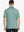 Back half-body view of male model wearing the Beryl Green Everyday Classic Solid Polo