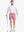 Full body front view of model wearing PINK 7 Inch Heather Performance Golf Shorts, holding a golf club