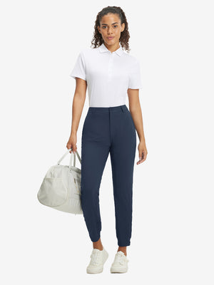 Woman wearing Women's Ultra-stretch Quick Dry Sweatpants with Ankle Zips in navy, full body front view