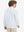 Back upper body of model wearing youth winter micro-fleece quarter zip pullover in white