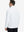 Back upper body view of the white lightweight golf pullover, model turns head slightly with ease.