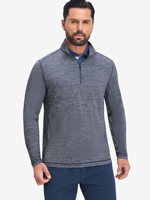 Front upper body shot of model wearing misty blue white grid featherweight midlayer quarter zip pullover