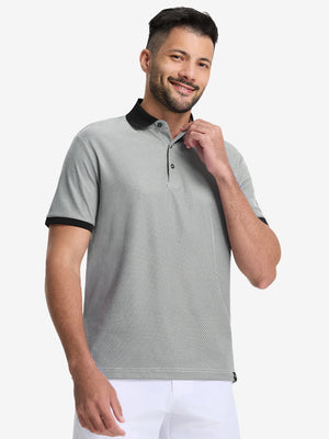 Front half-body shot of model wearing the black quick dry jacquard ribbed collar golf shirt