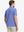 Back half-body view of BLUISH BLUE/WHITE STRIPE Polo with fitted silhouette
