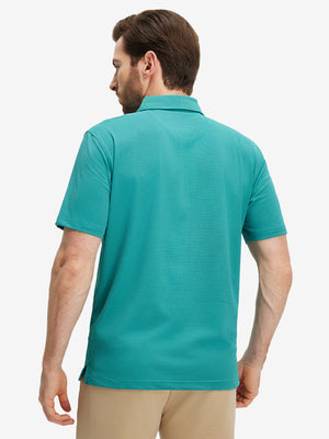 Back half-body view of a model wearing the turquoise feather weight jacquard polo shirts, highlighting the rear fit