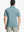 Back half-body view of GREEN ASH STRIPE Pinstripe Jersey Performance Polo worn by model								
