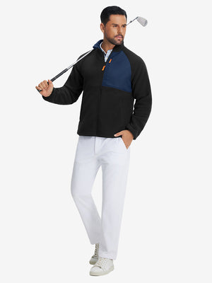 Full-body shot of the model wearing the reversible fleece jacket with 5 pockets in black.
