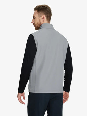 Back view of the light grey windproof golf vest, showcasing its sleek design and functional zippered pockets.