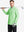Full-body shot of model holding a golf club in light green melange moisture wicking quarter zip pullover