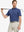 Model swinging golf club in DARK BLUE/LIGHT BLUE STRIPE Polo, sharp and athletic