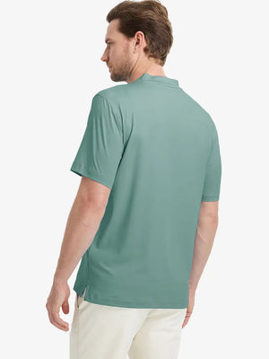 Back half-body view wearing Everyday Collarless Jersey Shirt in BERYL GREEN.