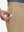 Detail view of front pocket on light khaki  flat front golf joggers pants with belt loops