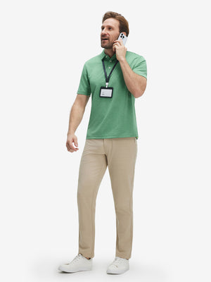 Full-body shot of model in light green  ultra-light quick dry moisture wicking collared polo shirt