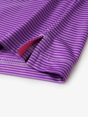 Detailed view of side hem slit on Cooling Stripe Golf Shirt in LILAC STRIPE, showing comfort and design