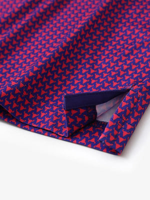 Hem slit detail of MAELREG Performance Jersey Print Polo in Purple Red Buffalo – comfort & movement