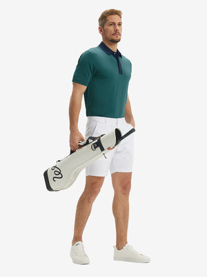 Full front: model in turquoise stripe upgraded two-tone striped quick dry polo shirt holding golf bag.