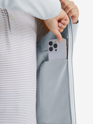 Close-up of the front side pocket detail on kids soft lightweight fleece lined jacket in misty grey, showing quality stitching.