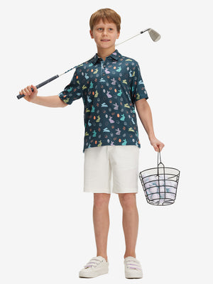 Full front: boy in easter bunny eggs performance print boys golf polo with club on shoulder.