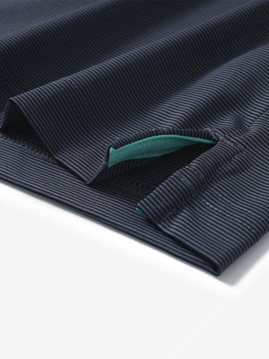 Hem detail of Long sleeve pinstripe jersey polo with neat finish in black stripe