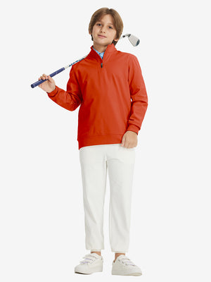 Youth Winter Micro-fleece Quarter Zip Pullover in orange, model carrying golf clubs on shoulder