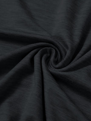 Close-up of fabric on men's long sleeve mock turtleneck shirt, soft knit texture with subtle stretch in black