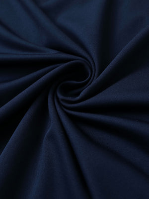 Close-up of navy chest print polo shirt fabric showing smooth texture and crisp graphic application area.