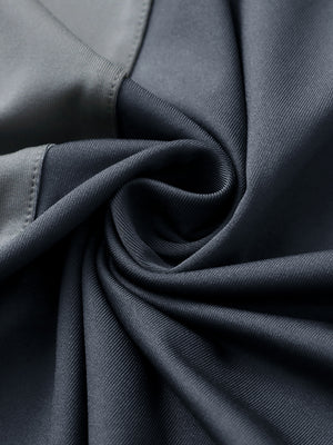 Texture close-up of Moisture wicking color block polo shirts with soft feel and dark grey detail