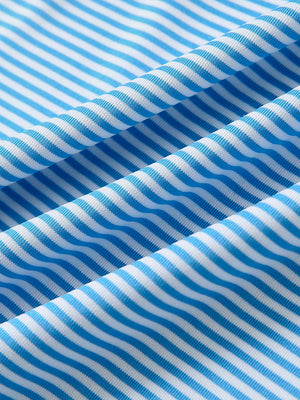 Close-up of sky blue stripe cooling stripe golf shirt fabric showing breathable texture and moisture-wicking stripes.
