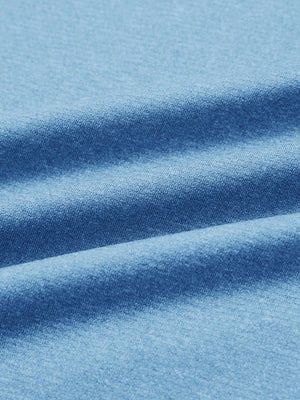 Close-up of classic heather pullover hoodies with 2 pocket fabric in light blue melange, soft knit texture